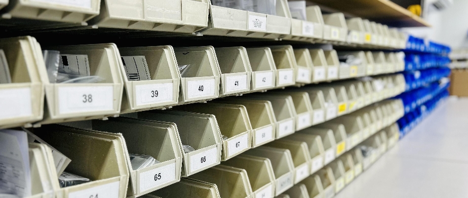 picture of lab tech inspecting lenses